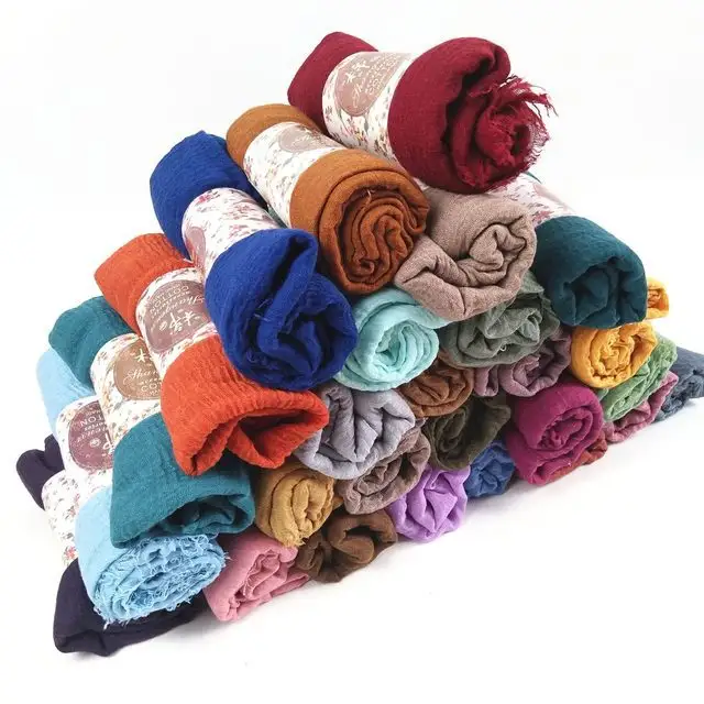 Hot Selling hochwertige monochrome Baumwolle Hanf Tasche langen Schal vier Seiten Quaste muslimischen Frauen Plissee Schal