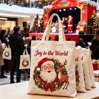 Sacs cadeaux en coton pour les fêtes, avec poignée en sangle de la même couleur, imprimé rennes et lettrage rouge, pour emballage de Noël