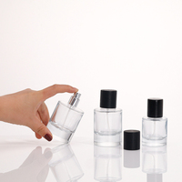 Flacons de parfum en verre 30ml 50ml cylindriques avec pompe pulvérisatrice, logo sérigraphié, boîte personnalisée couleur, transparents, pour usage cosmétique, non faciles à ouvrir
