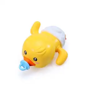 Wholesale clockwork play water windup little yellow ducks baby toys floating cartoon swimming duck bath toy