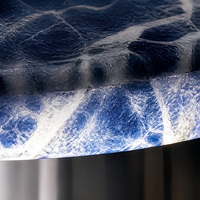 Table d'appoint ovale en marbre rétroéclairé avec base en acier miroir