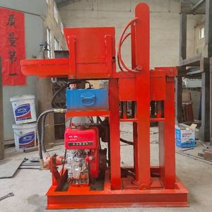Machine intelligente de fabrication de blocs de terre emboîtables GL2-25 <span class=keywords><strong>Henry</strong></span> pour briques de construction - Product Image 3
