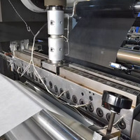 Machine de laminage à double bande entièrement automatique pour non-tissés spunbond, avec revêtement par extrusion à chaud
