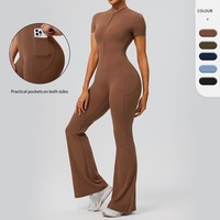 Combinaison de sport décontractée pour femme, demi-zip, manches courtes, pour la gym, avec contrôle du ventre et poches latérales, une pièce
