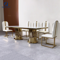 Meubles OEM Chine, table à manger créative de luxe en marbre de grande taille avec base en acier inoxydable