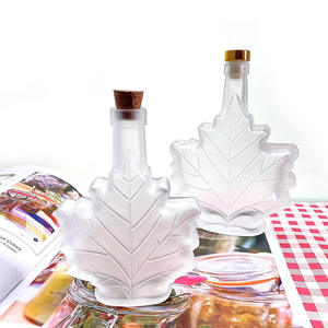 Bouteilles de diffuseur en verre en forme de <span class=keywords><strong>feuille</strong></span> <span class=keywords><strong>d</strong></span>'érable de luxe de 50ml 100ml 250ml pour sirop contre la toux vin whisky Gin boisson avec couvercle en aluminium - Product Image 6