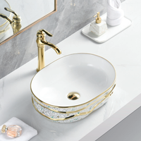 Lavabo de salle de bain en céramique de luxe de forme ovale, design artisanal, finition électrolytique multicolore, lavabo de table