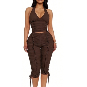 ชุดเซ็ต 2 ชิ้นสำหรับผู้หญิง เสื้อครอปคอ halter แบบรัดรูป และกางเกงขายาวรัดรูป เหมาะสำหรับงานปาร์ตี้และใส่ไปไนต์คลับ แฟชั่น - Product Image 1