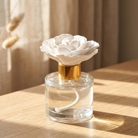 Vente en gros 100ML bouteille en verre parfumé céramique porcelaine fleur arôme plâtre désodorisant parfum de maison diffuseur d'huiles essentielles