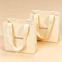 Sacs en papier cartonnés personnalisés avec logo imprimé, sacs de shopping en papier, emballages de luxe pour vêtements, sacs cadeaux