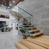 Escalier intérieur moderne et durable Anewson sur mesure avec marches en bois massif, structure en acier inoxydable et garde-corps en verre pour hôtels et entrepôts