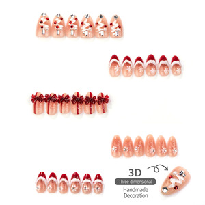 Faux ongles à presser en amande, motif flocon de neige 3D et nœud de Noël entièrement orné de strass, style français festif et charmant, vente en gros - Product Image 4
