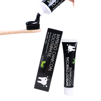 Élimine les taches de mauvaise haleine dentifrice au charbon de coco actif biologique pour le blanchiment des dents