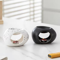 En gros, Brûleur de cire fondue et diffuseur d'huiles essentielles en céramique ovale creuse mouchetée, Noir et blanc mat, pour la maison et la chambre
