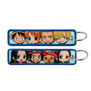 Nuevos 10 diseños de llaveros de anime bordados de moda, llaveros de Demon Slayer y One Piece, accesorios de estilo anime para bolsos - Product Image 4
