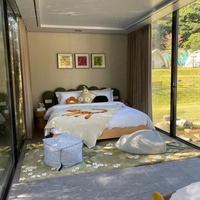 Maison capsule moderne de luxe en acier préfabriquée de 40 pieds, 1/2 chambre, mini-maison Apple, capsule spatiale solaire, salon, salle de bain pour usage hôtelier