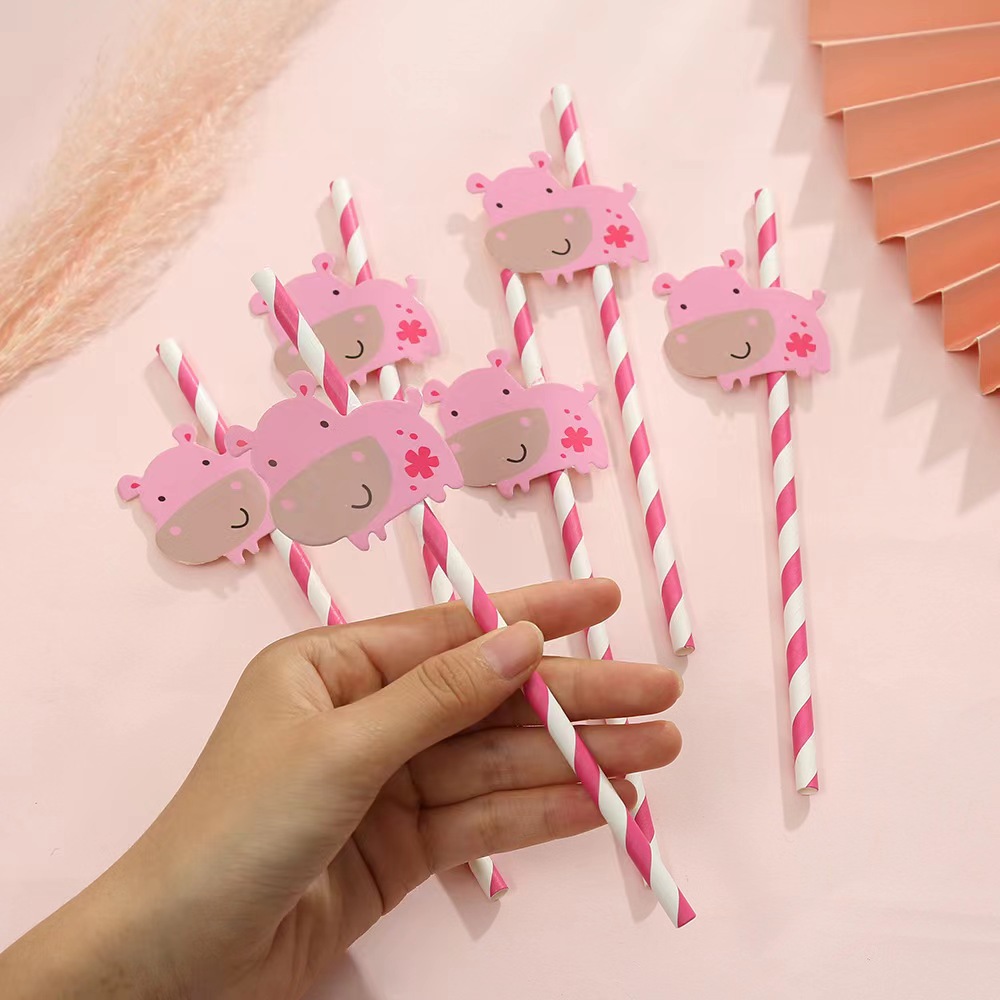 Pajita de papel con diseño de hipopótamo, rosa y rayas.