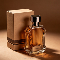 Flacon de parfum en verre vide de luxe, à nervures verticales et courbes irrégulières, avec bouchon en métal argenté, logo personnalisé par marquage à chaud et impression sur soie