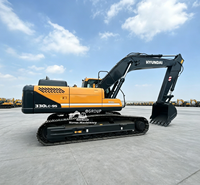 Excavatrice sur chenilles Hyundai Robex 330LC - 9S de 33 tonnes d'occasion, robuste, avec godet pour travaux en carrière