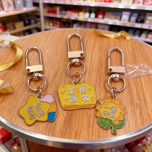 Llavero de metal esmaltado personalizado de aleación de zinc con diseño de girasol, de gran venta, para colgar en la bolsa, de lujo - Product Image 2