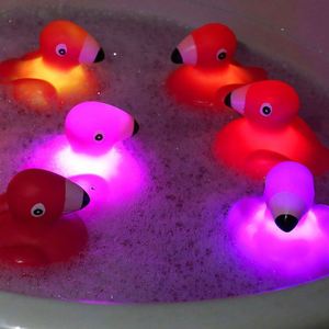 Hot Sale Summer Baby <b>Bathing</b> Flamingo Flashing Touch Sensing Luminous Floating Toy with Plastic Material for 0-24 Months - Product Image 3