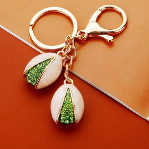 Llavero de lujo personalizado con diamantes de imitación, llavero con incrustaciones de diamantes de imitación en forma de pistacho, colgante para bolso, llavero novedoso con forma de <span class=keywords><strong>comida</strong></span>, colgante para bolso, regalos - Product Image 3
