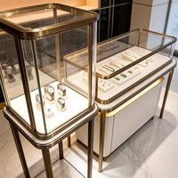 Vitrine à bijoux éco-responsable avec éclairage LED, construction durable, dimensions personnalisables, utilisation polyvalente pour la vente au détail et la décoration intérieure