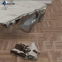 Table basse en acier inoxydable liquide - Finition miroir - Design à effet d'ondulation de l'eau - Moulage par compression de précision - JIANGXIN YSJJ-018