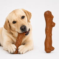 Jouet à mâcher pour chien en caoutchouc de couleur personnalisée en forme de branche avec rainures pour beurre de cacahuète pour les mâcheurs très résistants