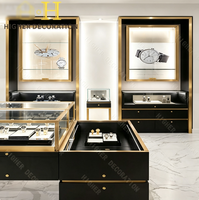 Vitrine de présentation de bijoux en acier inoxydable de luxe, design personnalisé pour la décoration de bijouterie