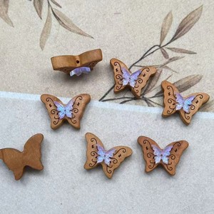 Perles papillon en bois incrustées de résine, ailes colorées pour la fabrication de bijoux et la décoration de la maison, forme 3D rose, violet, jaune, ébène - Product Image 3