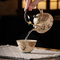 Théière Dunhuang Flying Apsaras à poignée en forme de poire, en céramique bleu et blanc avec glaçure rouge silex, résistante à la chaleur, design rétro
