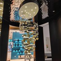 Ornement aérien personnalisé hôtel hall villa plafond décoration lustre en verre créatif doré dinosaure en forme d'oeuf suspension