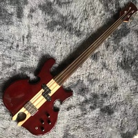 Guitare basse à 4 cordes de style ALEM personnalisée, manche traversant le corps, découpe en forme de cœur en bas