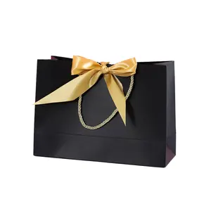 Individuelle Kartonverpackung mit Bandgriff Tütentasche Bolsas Matte Einzelhandel Luxus-Papier-Boutique-Einkaufstasche für Kleidung Geschenk mit Logo