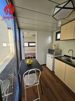 Cabine mobile préfabriquée de style chinois, petite et modulaire, pour camping-car, maison en acier mobile, panneau sandwich, cabine mobile Apple