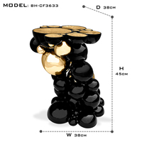 Table d'appoint Newton en aluminium laqué noir avec sphères plaquées or, design moderne et futuriste, option de tabouret polyvalent