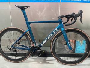 Vélo de route professionnel MCELO SK02-SHI MANO 105 7,8 kg en fibre de carbone, 24 vitesses, frein à disque Flat Mount, guidon intégré pour - Product Image 1
