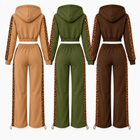 Ensemble deux pièces pour femme en molleton épais 350 GSM, comprenant un sweat à capuche court zippé et un pantalon large, avec empiècements léopard, idéal pour l'hiver.