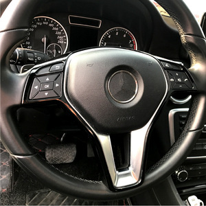 Kit de garniture de volant Mercedes-Benz en fibre de carbone noir piano, argent mat ABS pour les classes A, B, C, E, GLA, CLA, GLK, CLS - Product Image 1