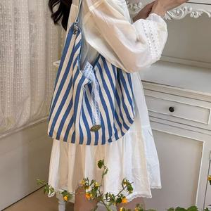 Bolso de lona a rayas para <span class=keywords><strong>mujer</strong></span>, nuevo estilo verano 2026, estampado de letras, bandolera de doble cara, bolso escolar para estudiantes - Product Image 3