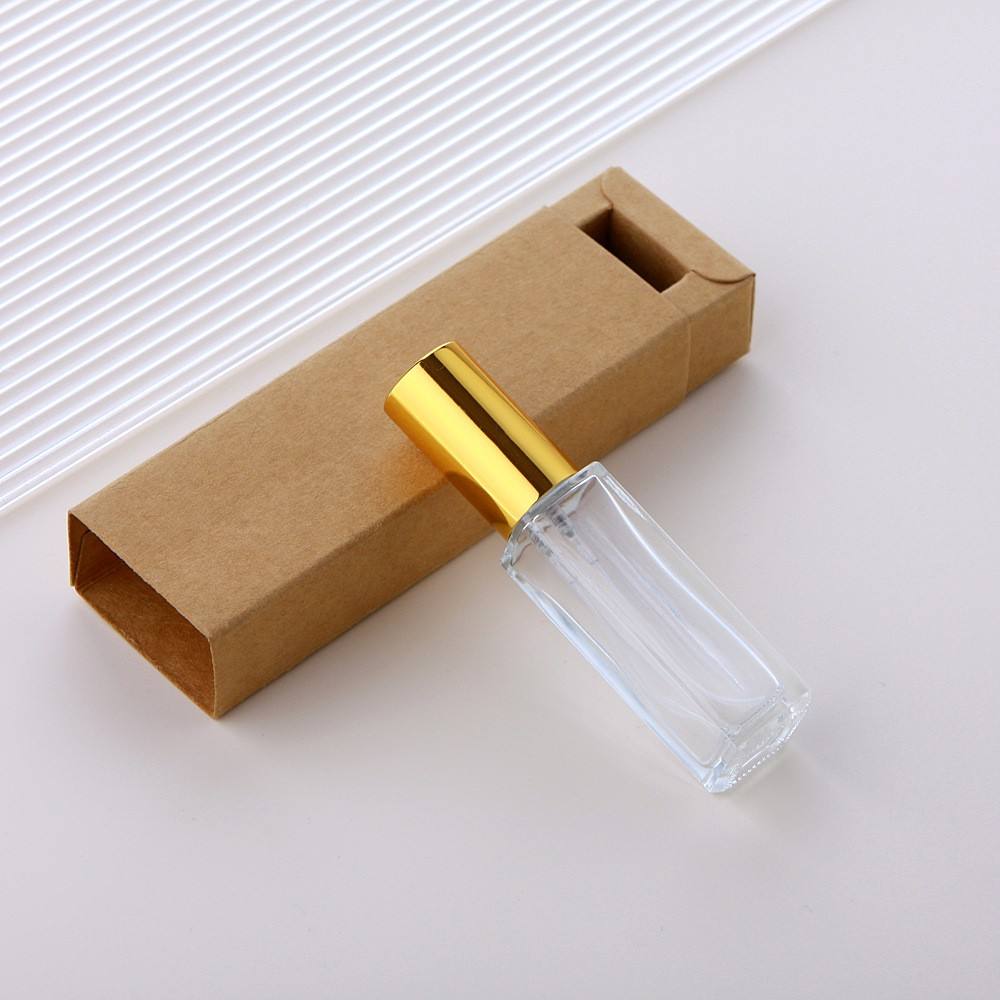 Clear glass spray bottle + gold cap + brown box