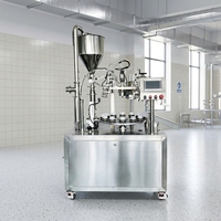 Machine semi-automatique de remplissage et de scellage de tubes souples pour dentifrice, cosmétiques, produits de lavage et de soin, chocolat et graisses