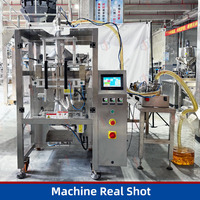 Machine d'emballage verticale automatique pour huile d'arachide, huile de palme, huile végétale et huile de piment en sachets