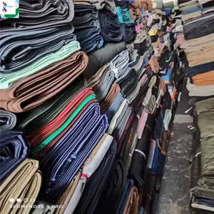 Textile de maison Afrique coton mélangé pas cher prix tissu par kg en stock lot coton sergé C grade pièces tissu stocklot pour vêtement