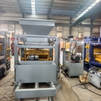 Unité de fabrication de blocs de béton hydraulique automatique QT4-15, multifonctionnelle, produisant des briques creuses, solides et autobloquantes