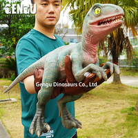 Marionnette de dinosaure faite à la main, simulation de bébé dinosaure