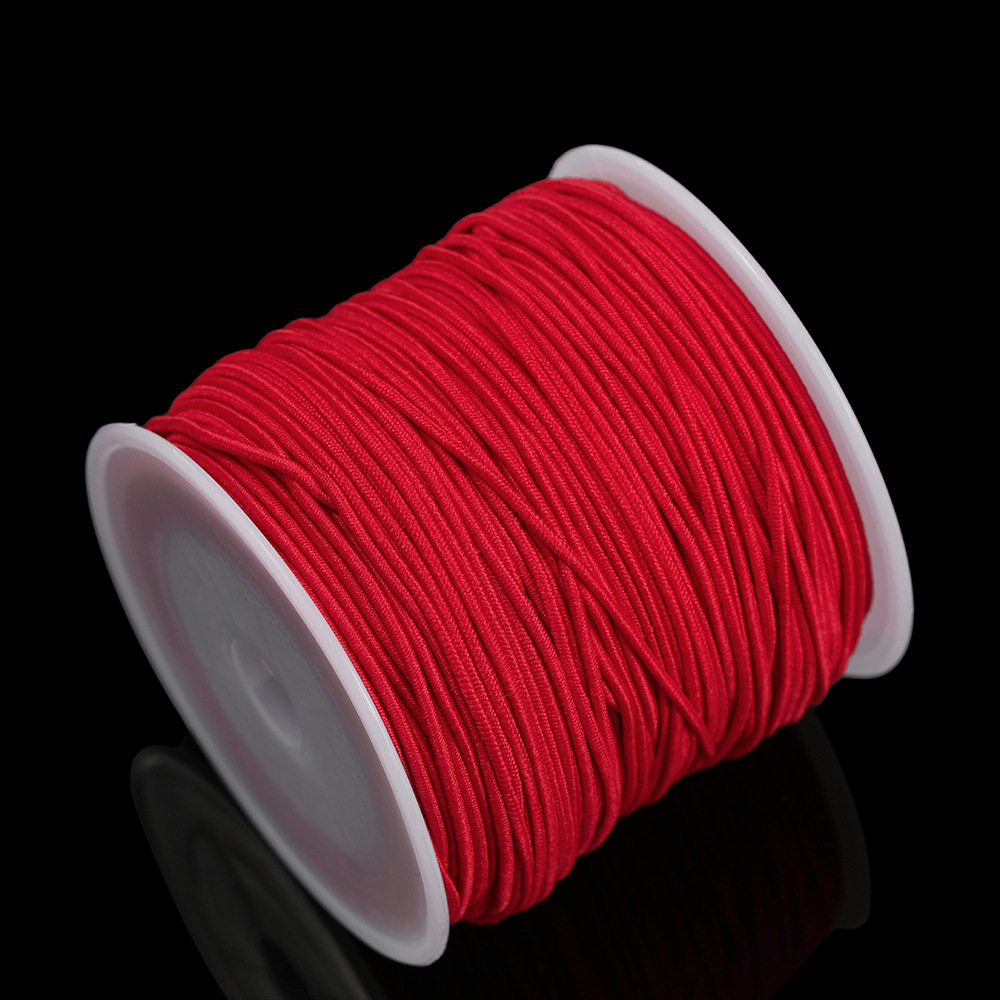 Fil élastique filé à âme rouge