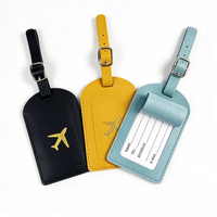 Vente en gros d'accessoires de voyage bon marché étiquette de bagage étiquette de valise logo personnalisé étiquettes à bagage blanches en cuir PU