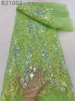 Tissu en dentelle de tulle blanc élastique 100% polyester brodé de perles de paillettes irisées effet laser pour robes de mariée